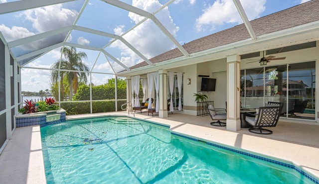 Latitude Adjustment - A Gorgeous Riverfront Home in the Quiet Fort Myers Shores Area