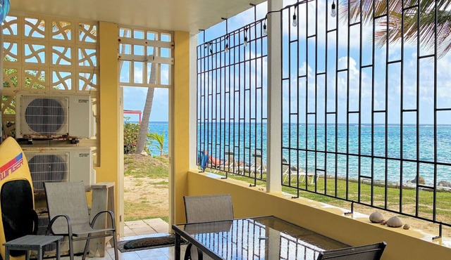 Latitude Adjustment at Colony Cove-2 bed/2 bath TROPICAL BEACHFRONT condo w/pool