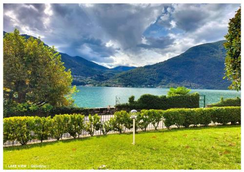 LFSUITE LuganoLake Terrazza Spiaggia privata Parking WI-FI Netflix