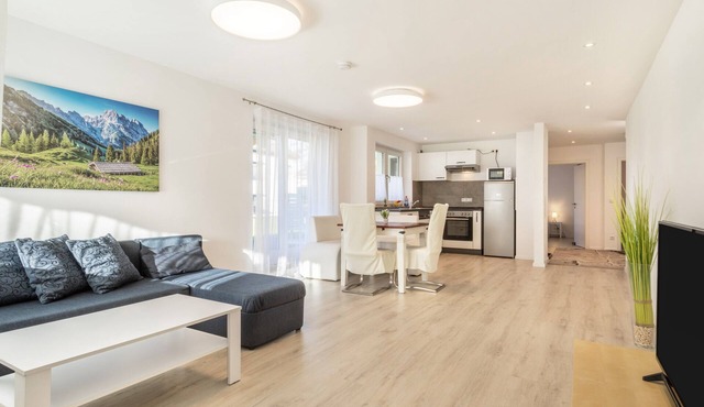 Light-flooded and Modern Apartment “Gartenstraße” with Terraces and Garden
