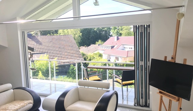 Light-flooded living room on 140 sqm in Bergisch Gladbach - Moitzfeld