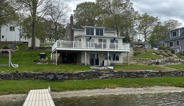 Located on Coventry Lake. Walk out the back door and you are in the lake!