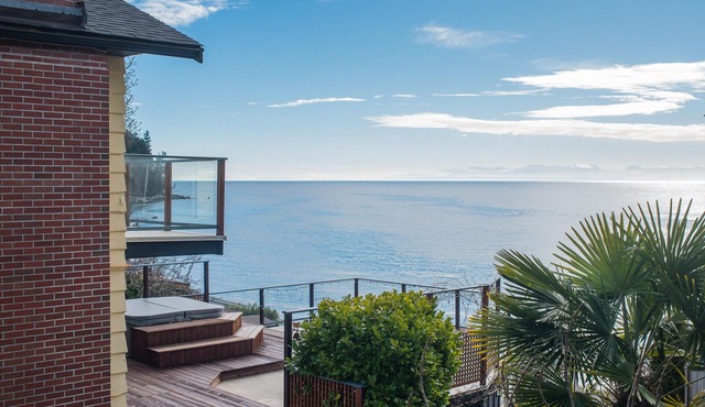 Lovely Waterfront Beach Haven with Hot Tub & SUP