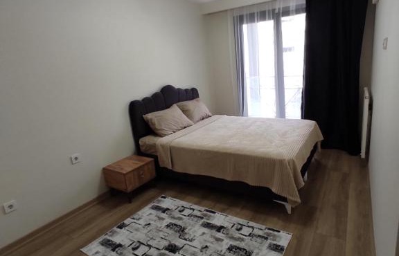 Luxurious 2 bedroom flat with pool and garden.