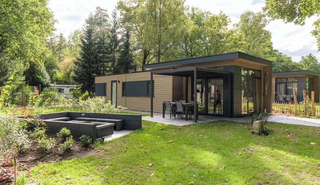 Luxurious Cannenburch Deluxe, atmospheric outdoor area and lounge with outdoor fireplace.