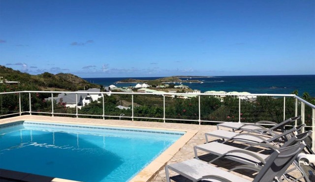 Luxurious Caribbean Contemporary Charm with Breathtaking Panoramic Ocean View