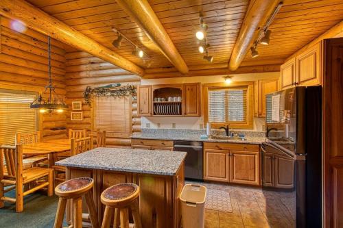 Luxurious Forest Cabin with Hot Tub and Game Room Near Outdoor Adventures in Island Park, Idaho