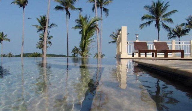 Luxurious semi - detached 2 bedroom Villa with 2 superb pools and sea views