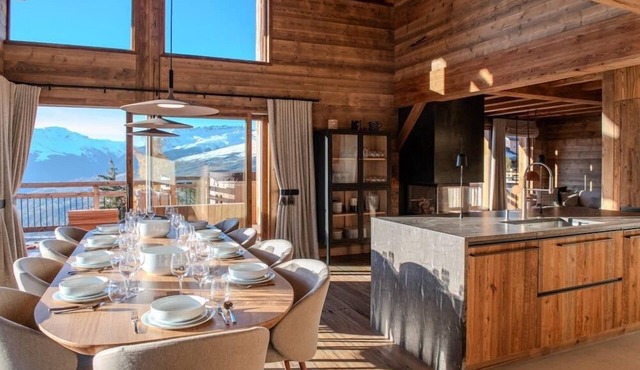 Luxury 10 person, 5 bedroom chalet with hot tub, sauna and steam room.