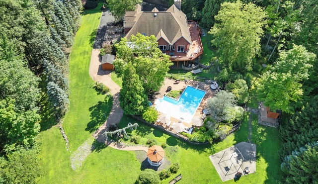 Luxury 10BR Escape w/Pool, Hot Tub & Game Lounge