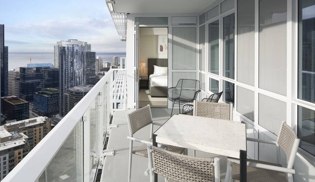 Luxury 2-BR Sky Suite with Stunning Views, Pools, & Top Seattle Amenities