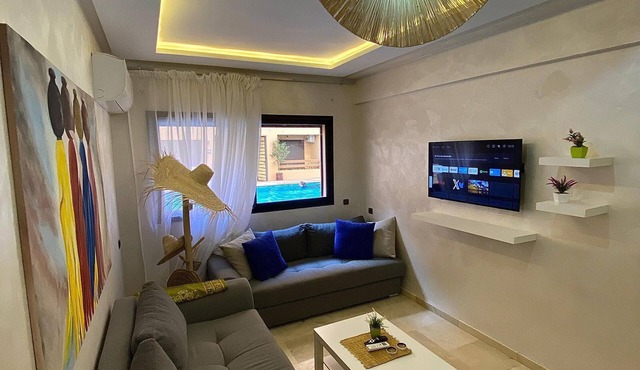 Luxury apartment with pool view next to the train station in Gueliz