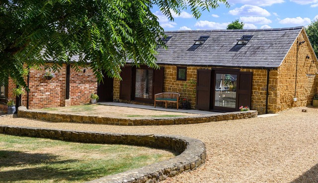 Luxury Barn conversion in village farm setting.