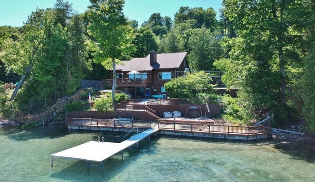 Luxury Bayfront Retreat on Grand Traverse Bay with Private Beach and Sport Court