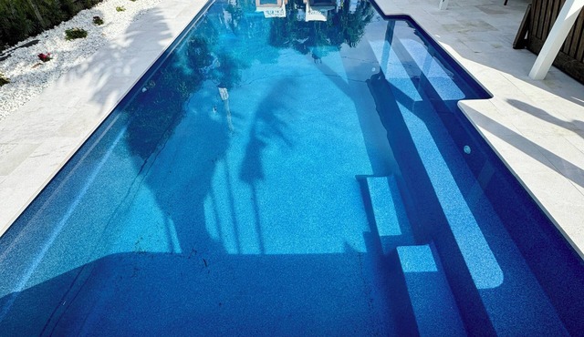Luxury beach house, heated pool, 10 minute walk to beach!