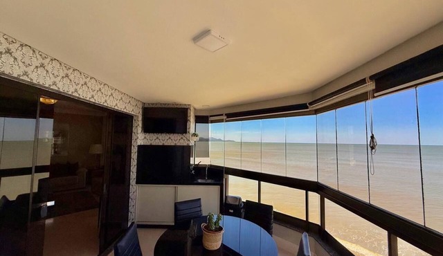 Luxury beachfront apartment with 4 bedrooms, 2 parking spaces, and an unbeatable location.