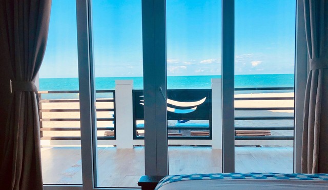 Luxury Beachfront Cabana with swim up pool bar