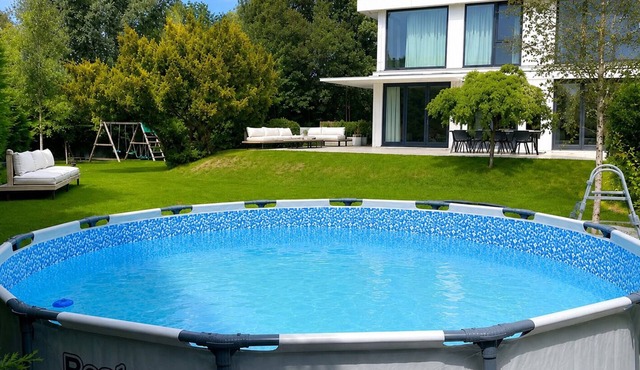 Luxury family villa with a large private garden and swimming pool