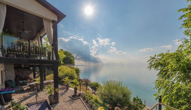 LUXURY LAKEFRONT HOME WITH PRIVATE BACKYARD BEACH & SPECTACULAR VIEW