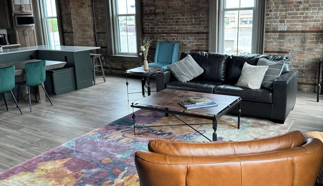 Luxury Loft Riverfront Condo, prime Oshkosh location with spacious rooftop patio