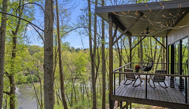 Luxury, Modern Treehouses- River Views & Farmstay Experience