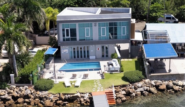 Luxury Ocean Front Villa with Heated Infinity Pool, Private Pier and Kayaks