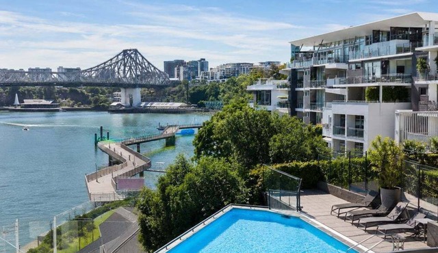 Luxury Riverfront Apt w/Pool & City Views