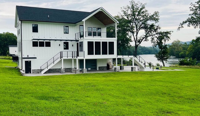 Luxury Riverfront Home Getaway with Hot Tub