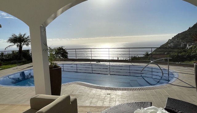Luxury villa with private heated pool, garden and views of the sea and mountains