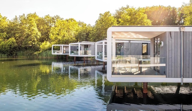 Luxury water cube extending 12 metres into the lake with generous bathroom and air conditioning. A unique holiday experience on the water.
