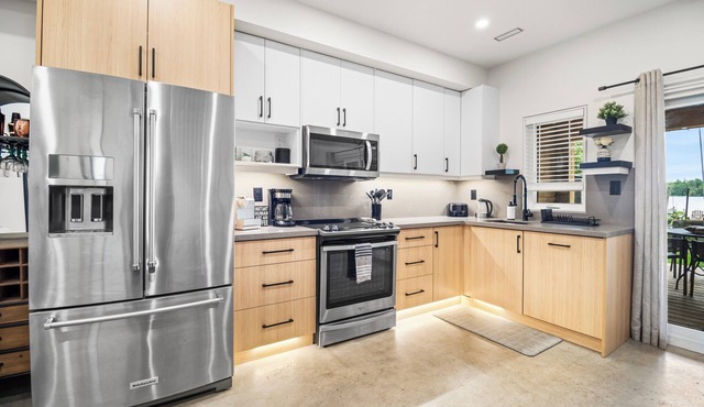 Luxury Waterfront Retreat with Sauna, EV Charger, Pizza Oven & Lake Views