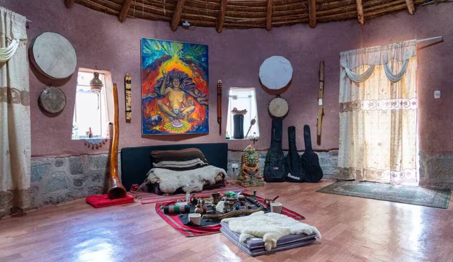 Magic house with alpacas and sacred temple (maloca)