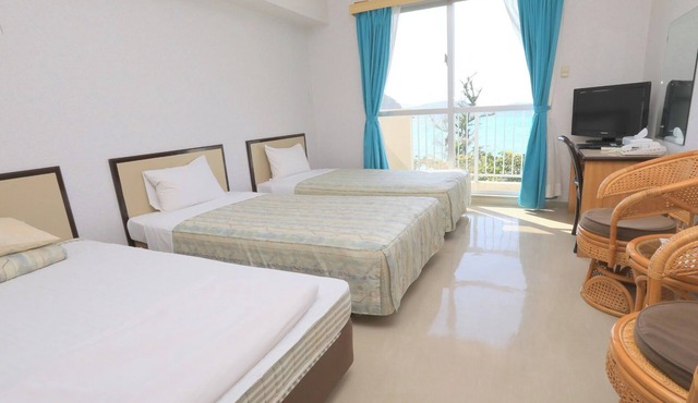 Main building ocean side western style triple room with unit bath Dinner and breakfast/Shimajiri-gun Okinawa