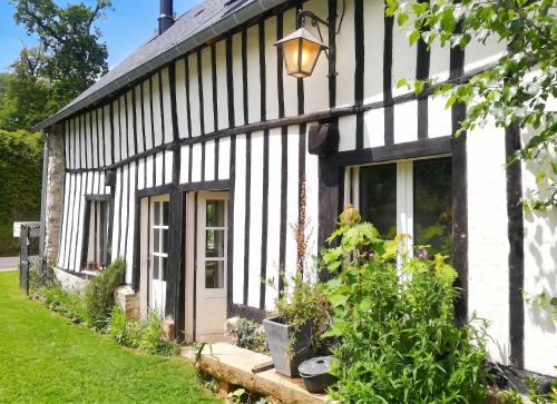 Maison rustique charmante à Sassetot-le-Mauconduit, jardin.