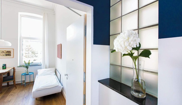 Maisonette with sunny balcony facing the quiet garden courtyard