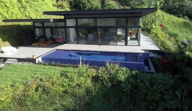 Majestic Jungle and Ocean view 2-bedroom house with 2 pools and a gym on 4 acres