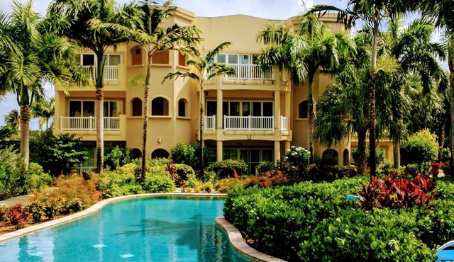 “Mango” - Vibrant Condo Yards from BEACH at Hamilton Beach Villas & Spa