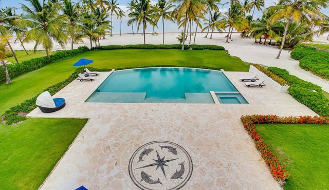 Massive Beachfront Palace with Chef and Butler