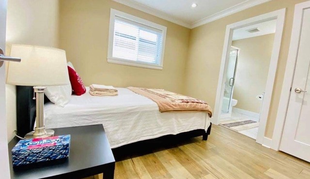 Master bedroom with private bathroom in New home