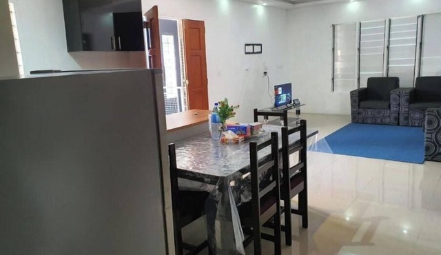 Master Bedroom with shared kitchen and living room