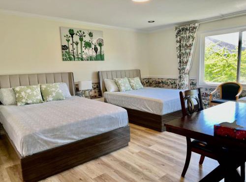 Master Bedroom with Two Queen Sized Bed