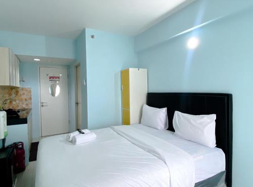 Minimalist Studio Grand Sentraland Karawang Apartment By Travelio