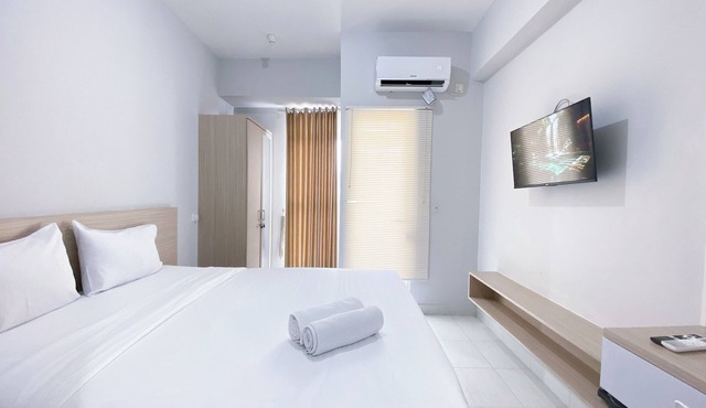 Minimalistic and Cozy Studio Amartha View Apartment