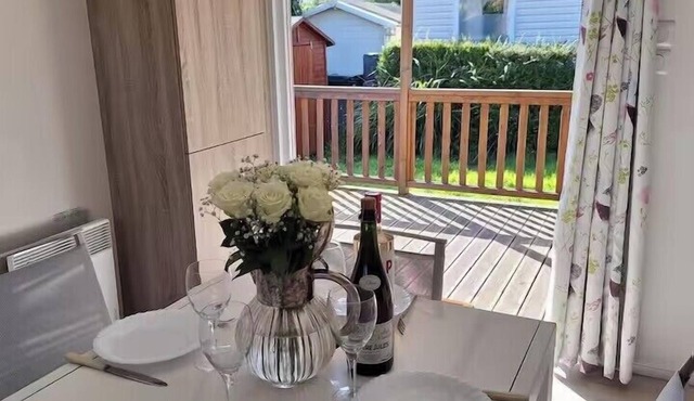 Mobile home with shared pool in Saint-Arnoult