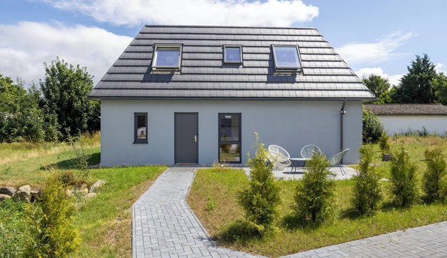 Modern holiday home with a terrace and a garden