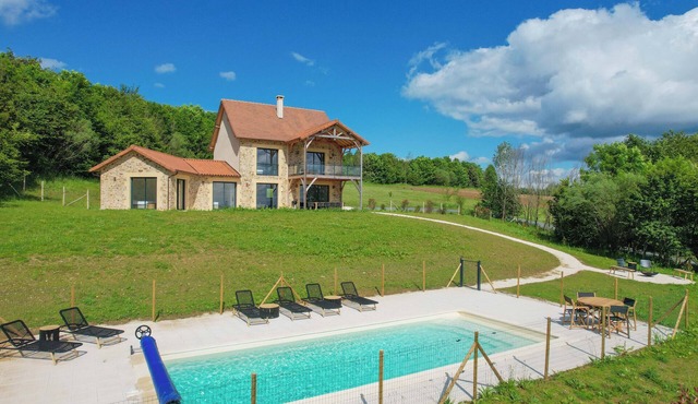 Modern vacation home with private pool on estate with golf. Pets allowed!