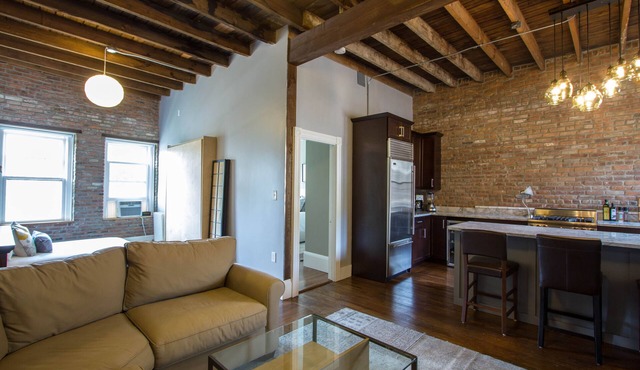 Modern 2-bedroom loft condo near BC, BU, hospitals & train w/parking available.