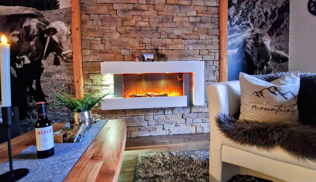 Modern 2-room apartment in Allgäu style with alpine panorama in a central location.