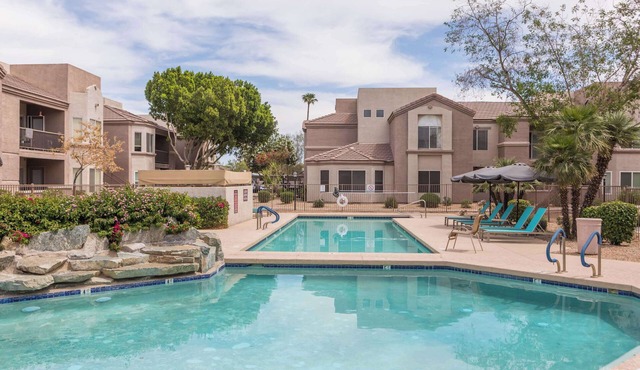 Modern 2BR Retreat with Pool, Gym & Balcony