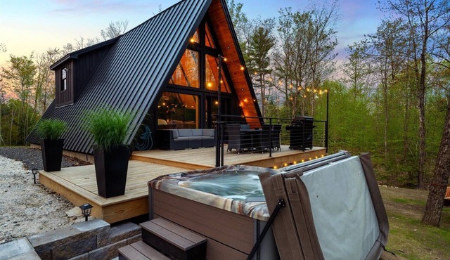 Modern A-frame house with hot tub and fire pit. Very private!
